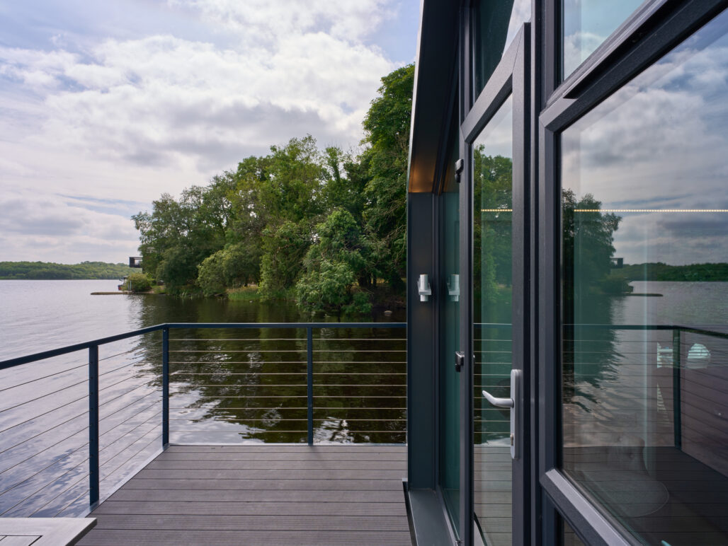 Close up of front and front balcony of C250 houseboat on a lake in Fermanagh with lovely view over the lake