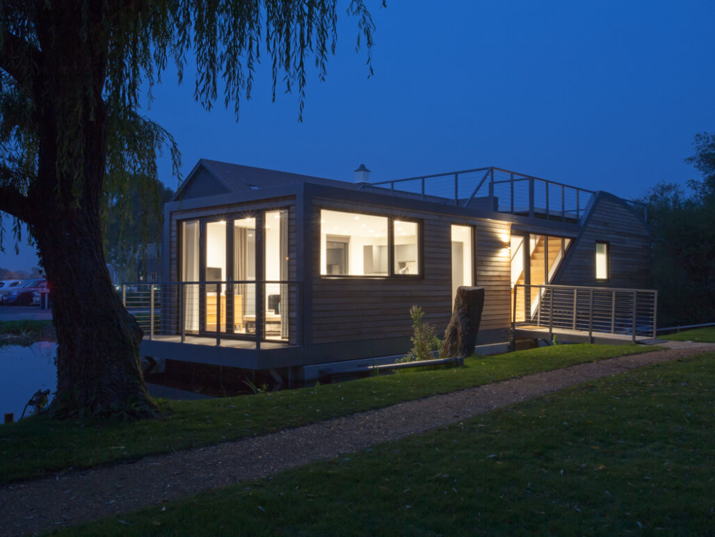 R750 houseboat Chichester exterior front and side elevation at night