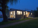 R750 houseboat Chichester exterior front and side elevation at night